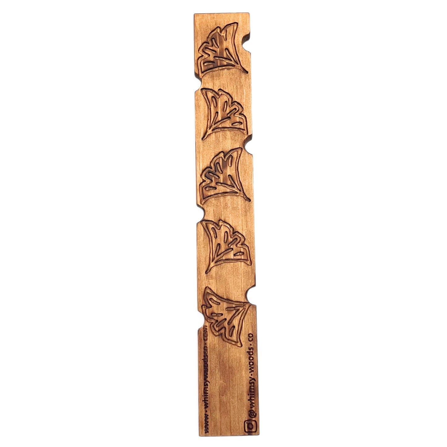Decorative plant stake with large flowers on back