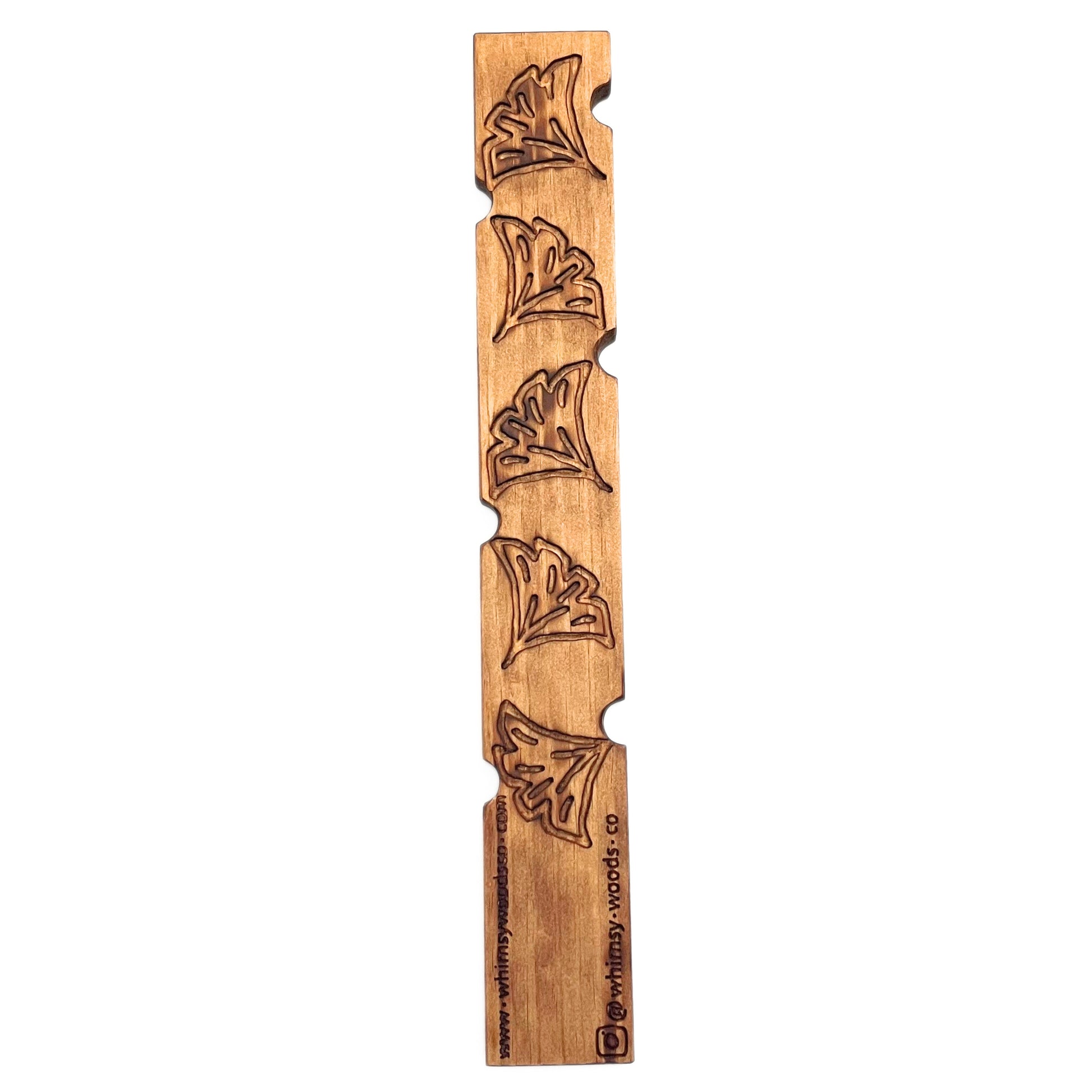 Decorative plant stake with large flowers on back