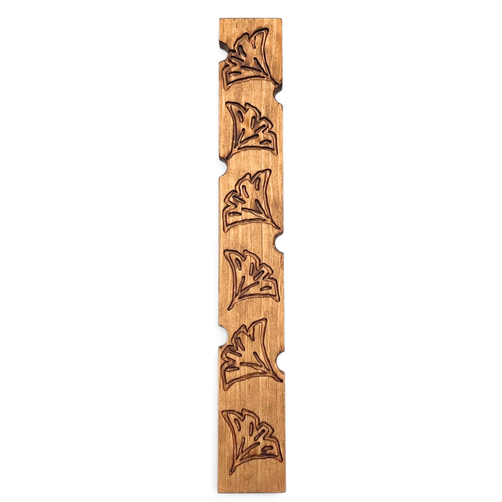 Decorative plant stake with large flowers on front