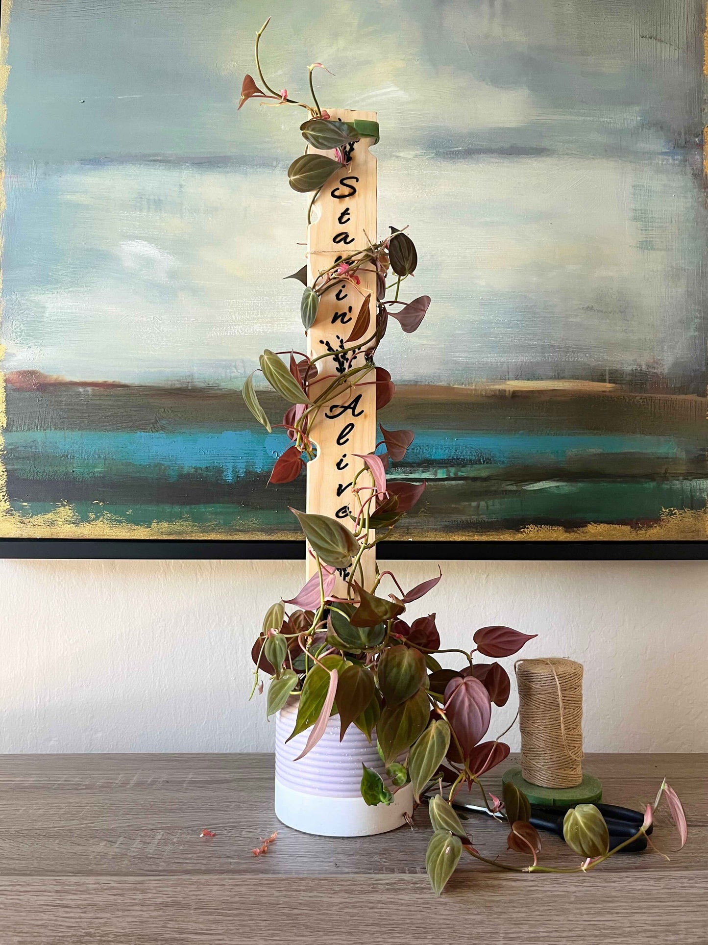 Decorative carved wooden plant stake 