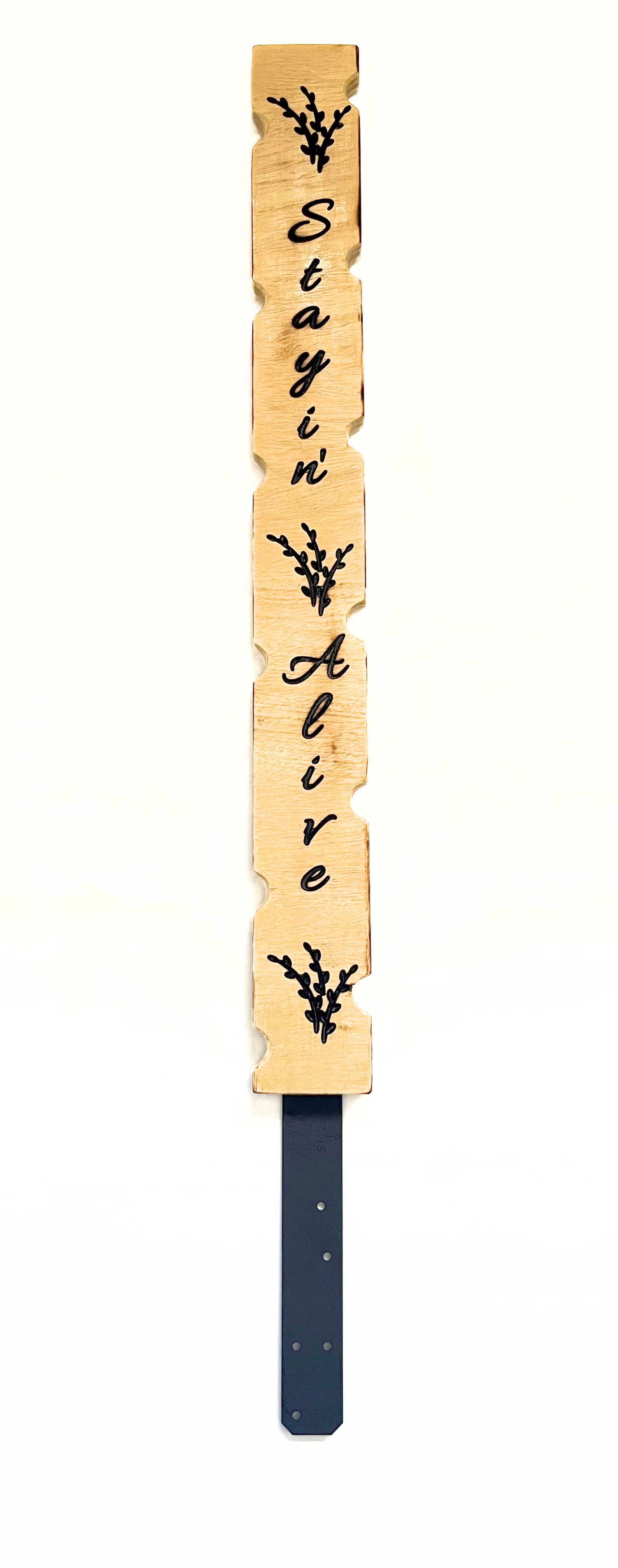 Stylish plant stake carved in wood