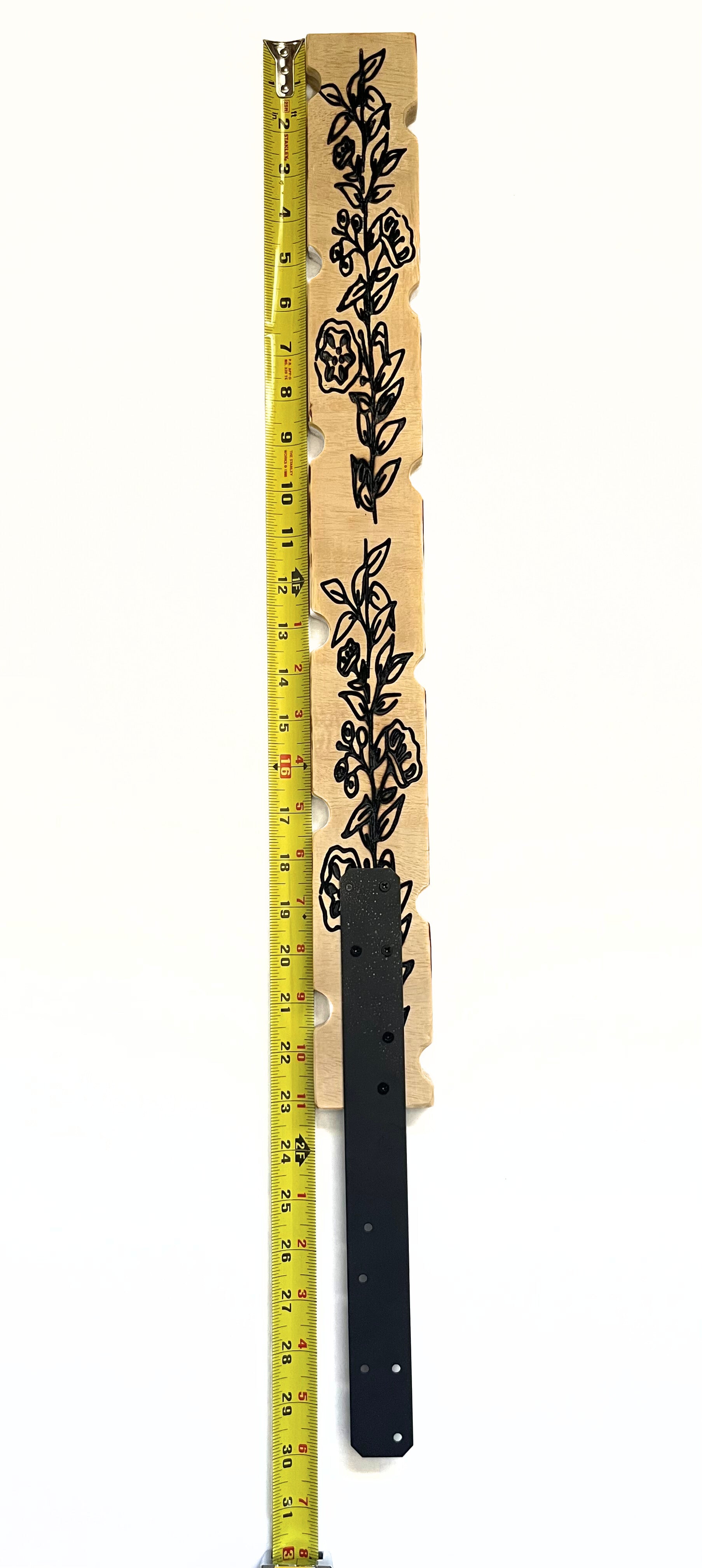 Decorative plant stake carved in wood