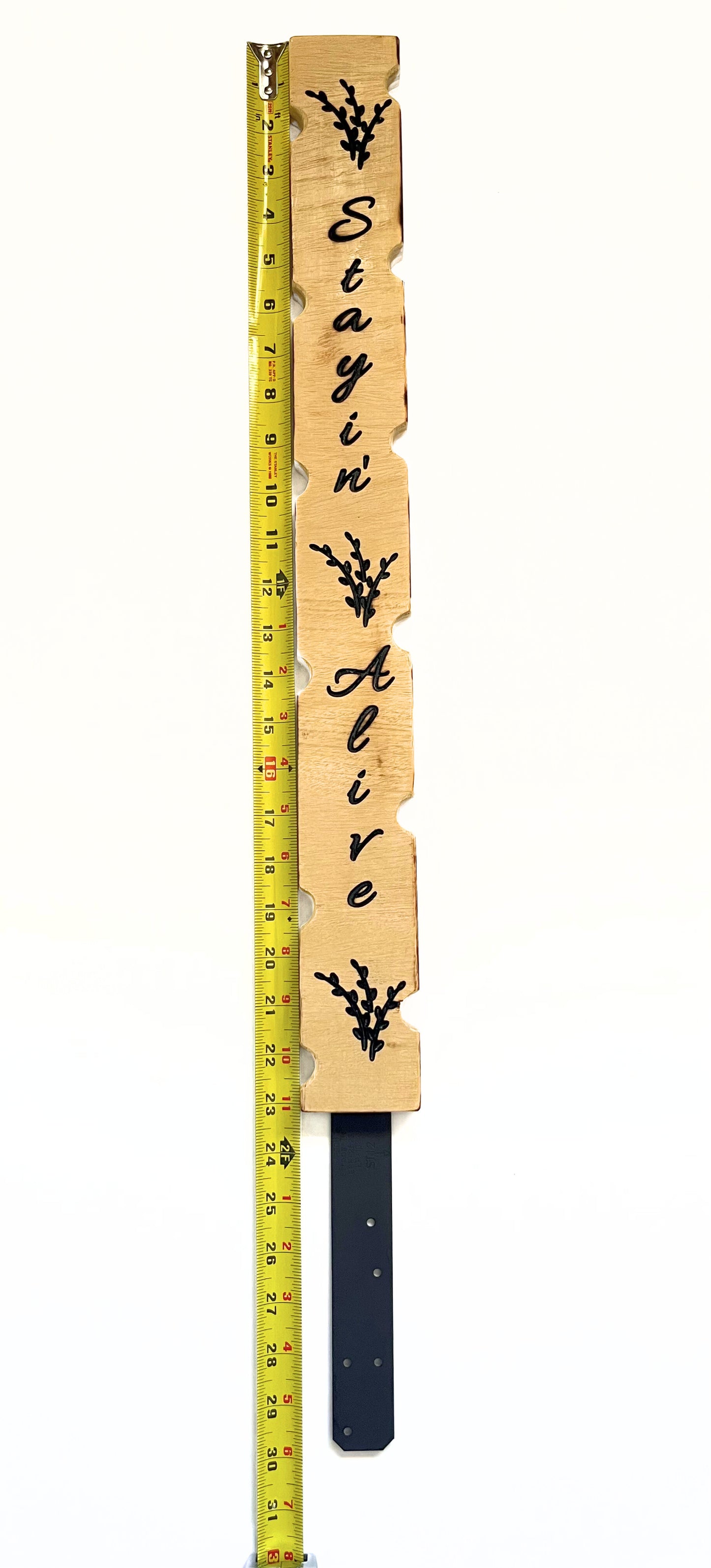 Decorative plant stake carved in wood