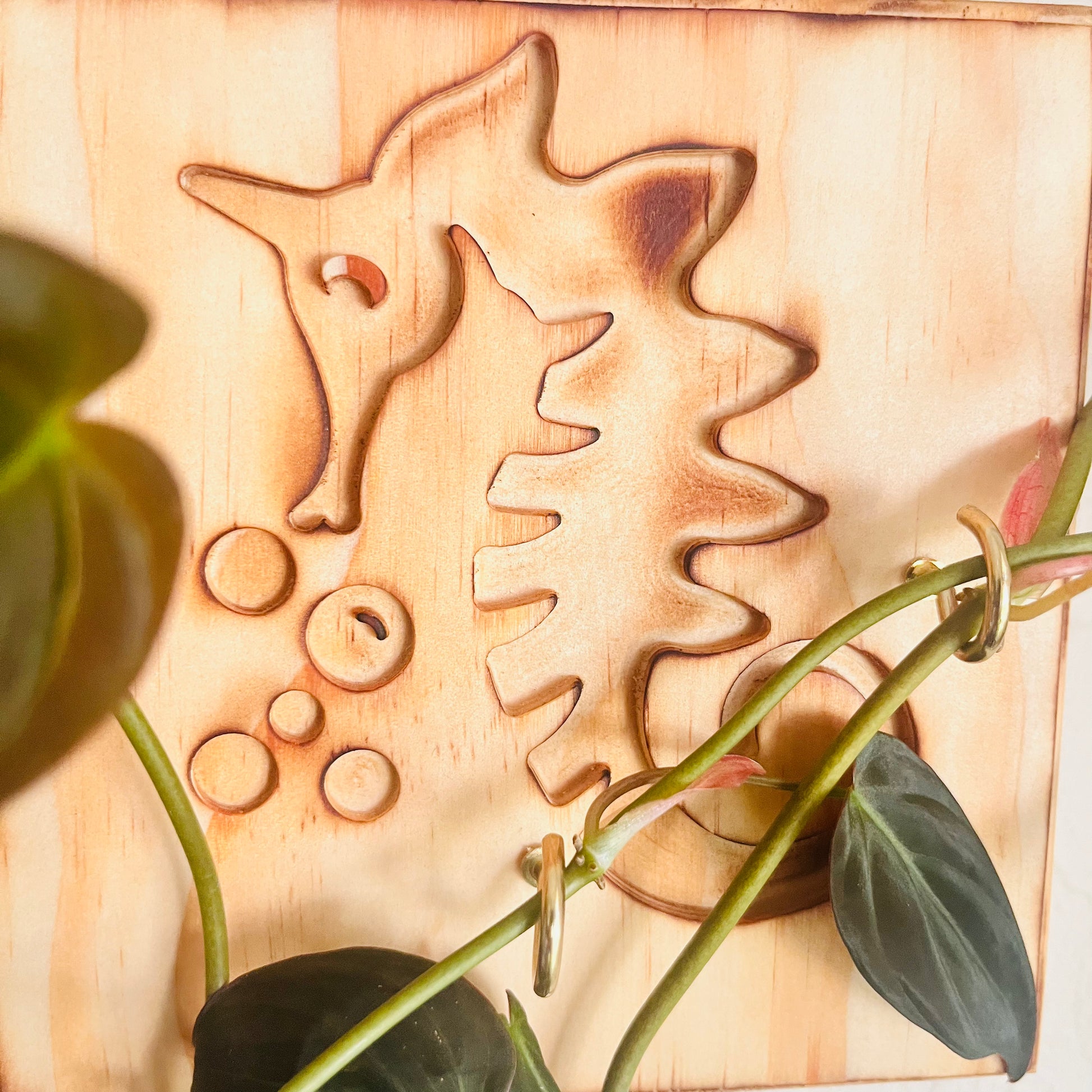 Wooden_wall_trellis_for_plants_or key holder with_Sea Horse design closeup
