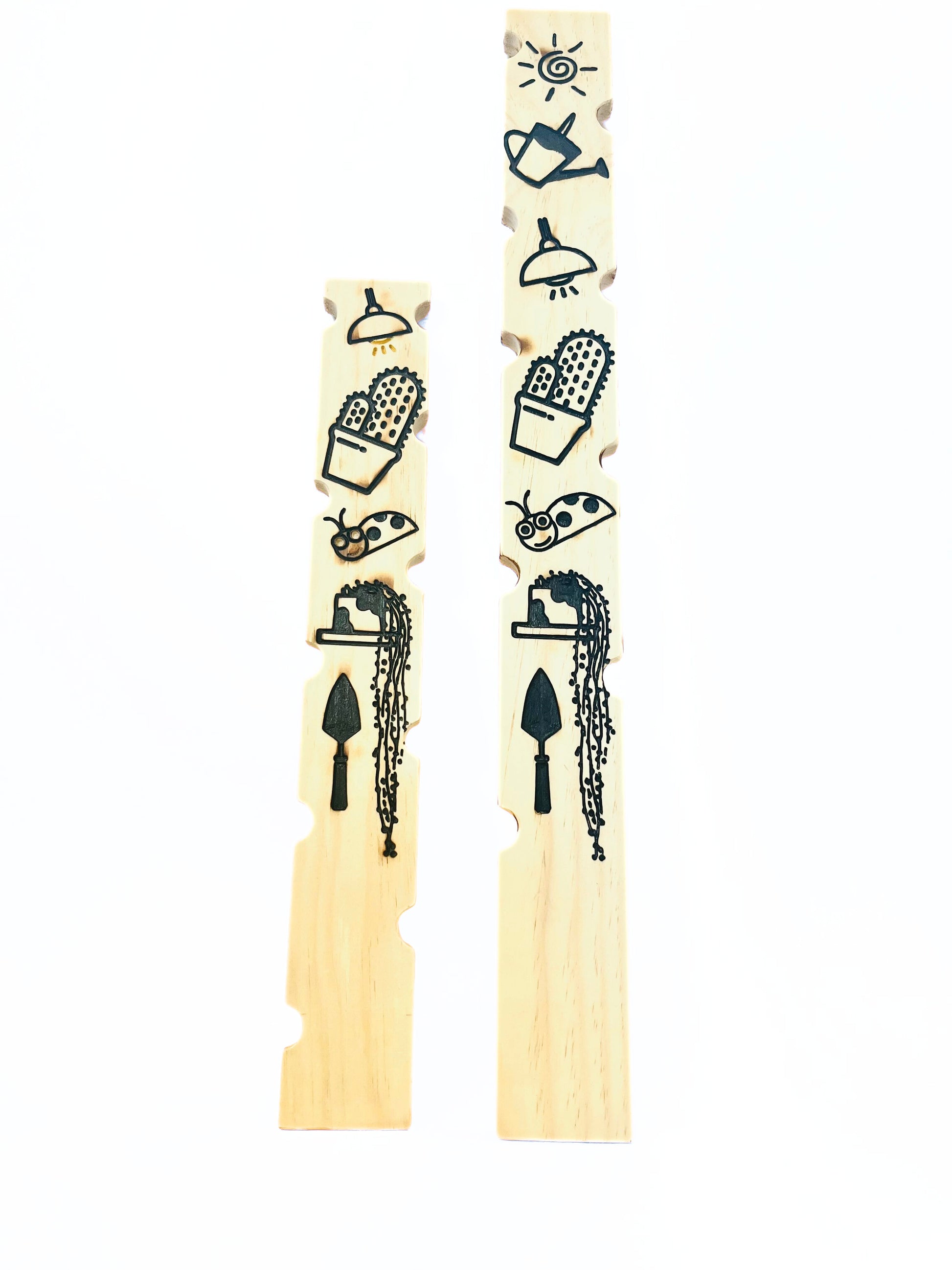 plant stakes 24 inch and 30 inches long with fun images on the back