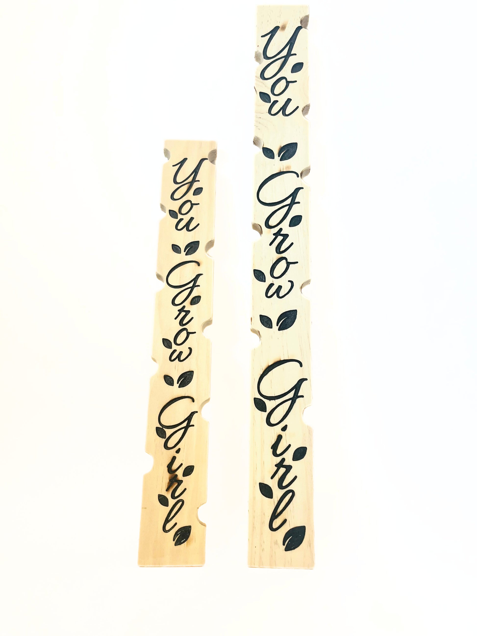 carved wooden plant stakes