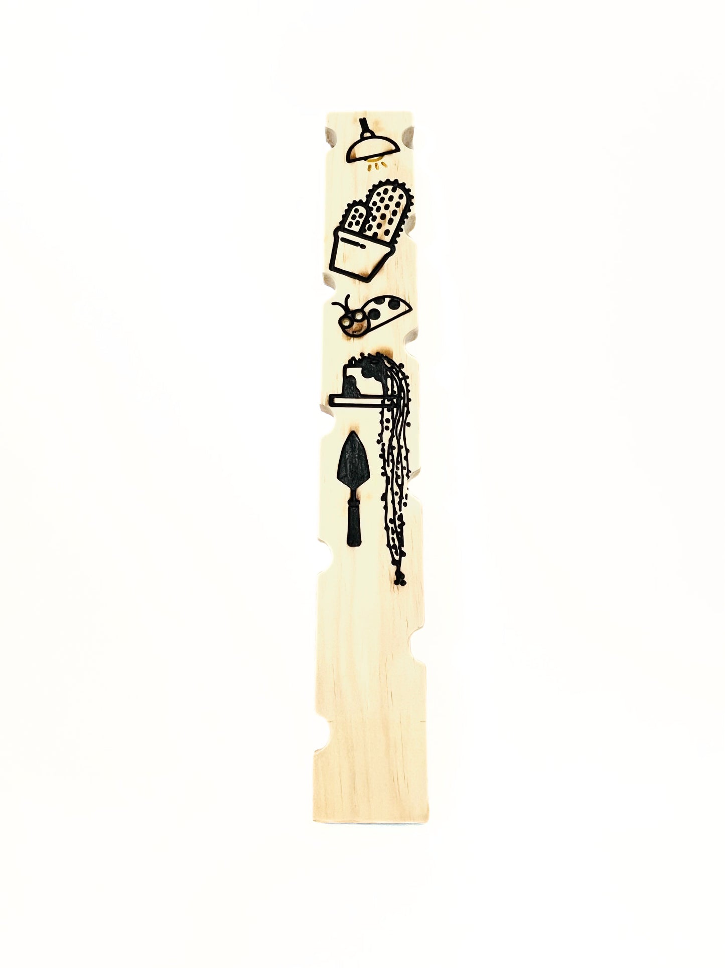Carved wooden plant stake back view